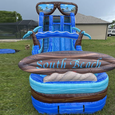 Приготовьтесь к 40 футовой надувной горки с бассейном и огромной доской для серфинга.