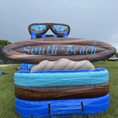 Приготовьтесь к 40 футовой надувной горки с бассейном и огромной доской для серфинга.